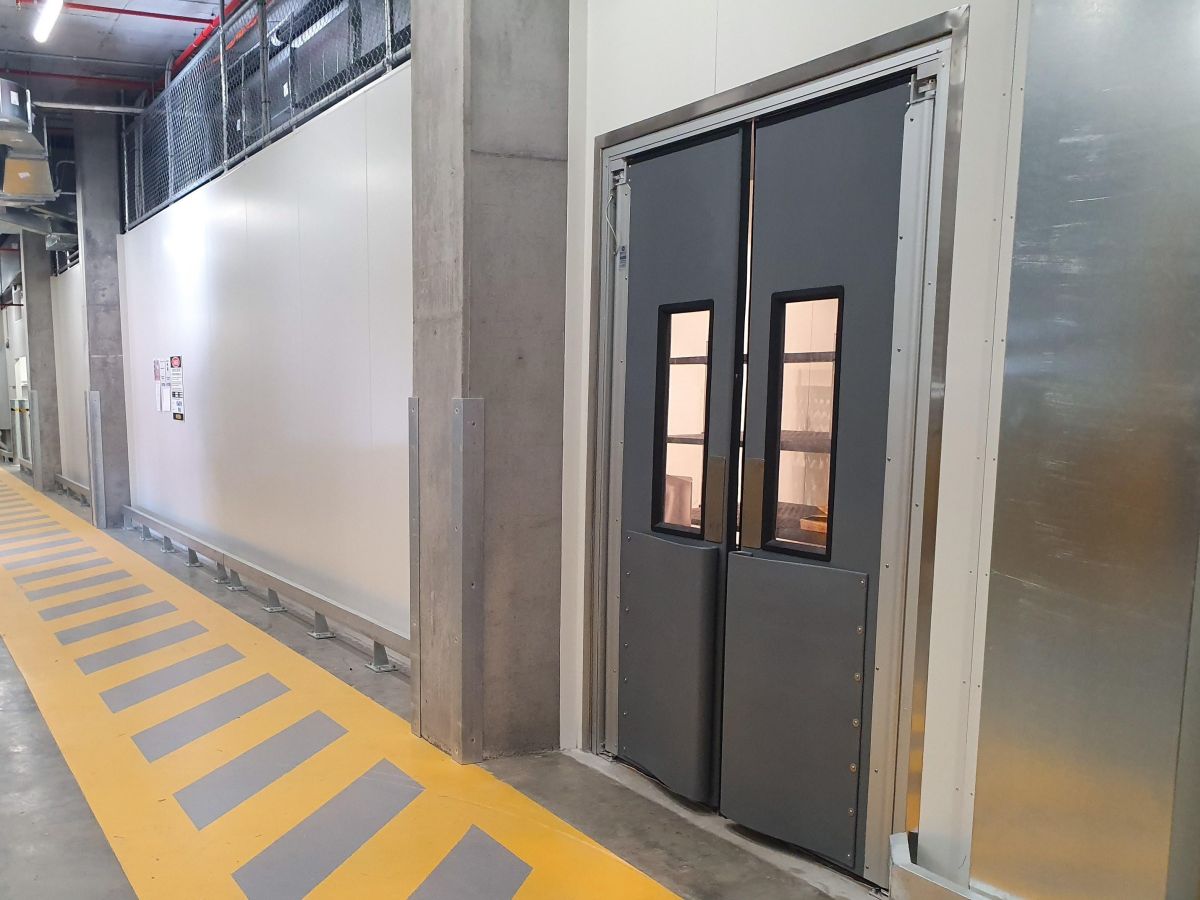 Premium 4500 SERIES Swing traffic doors in the back area of WW Montague West End