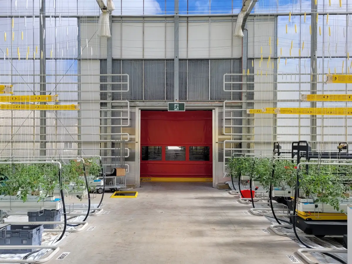 A closed rapid roll door in a hydroponics facility.