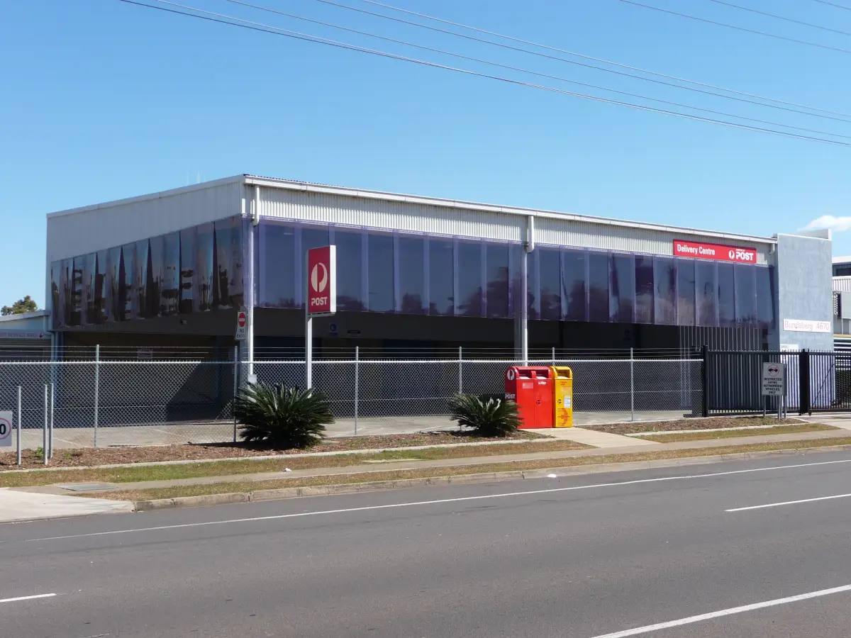 Short PVC strip curtains hanging from the roof of an industrial building, delivery centre of Australia Post