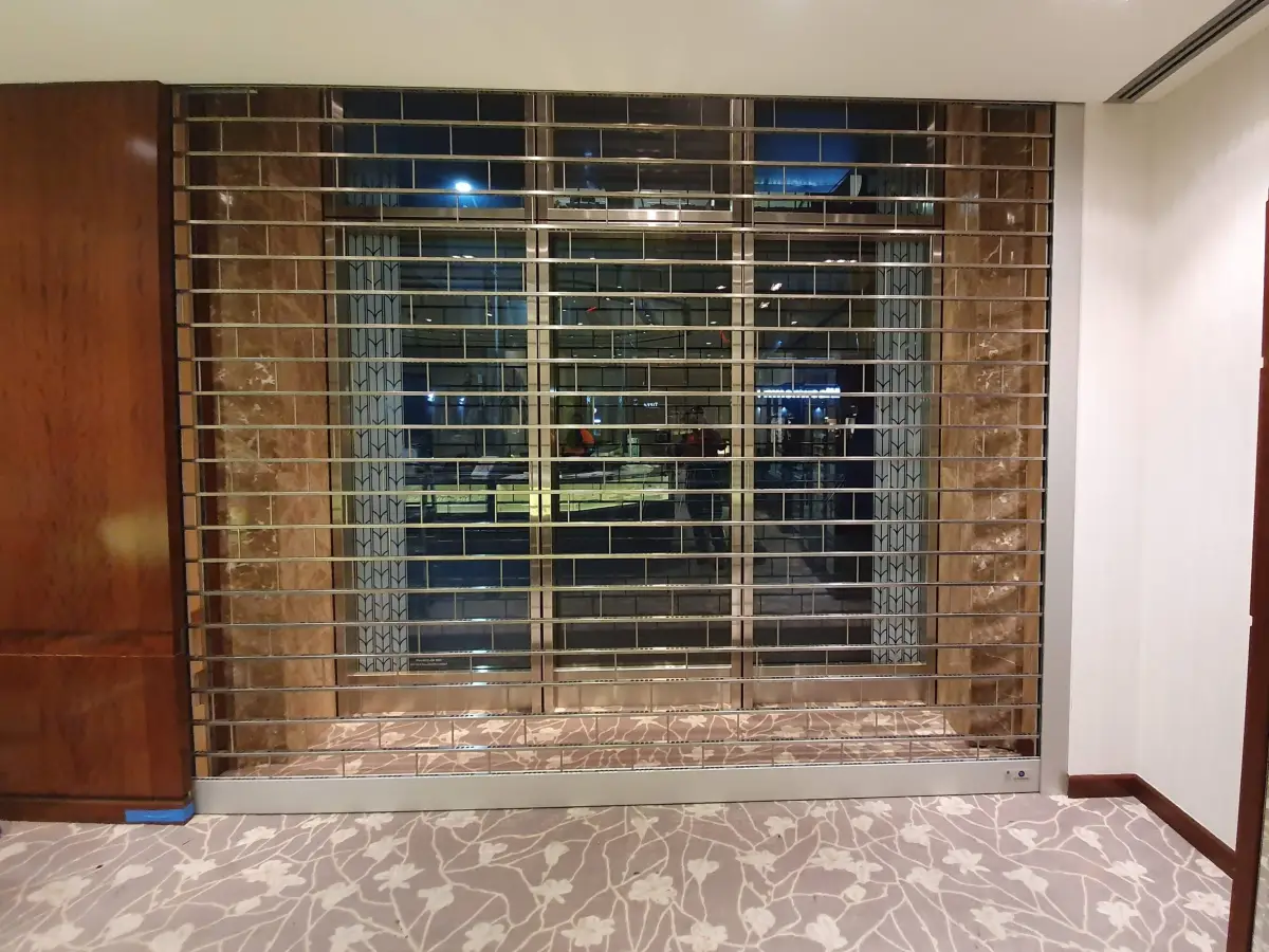 A security roller shutter on the front of a Tiffany retail shop