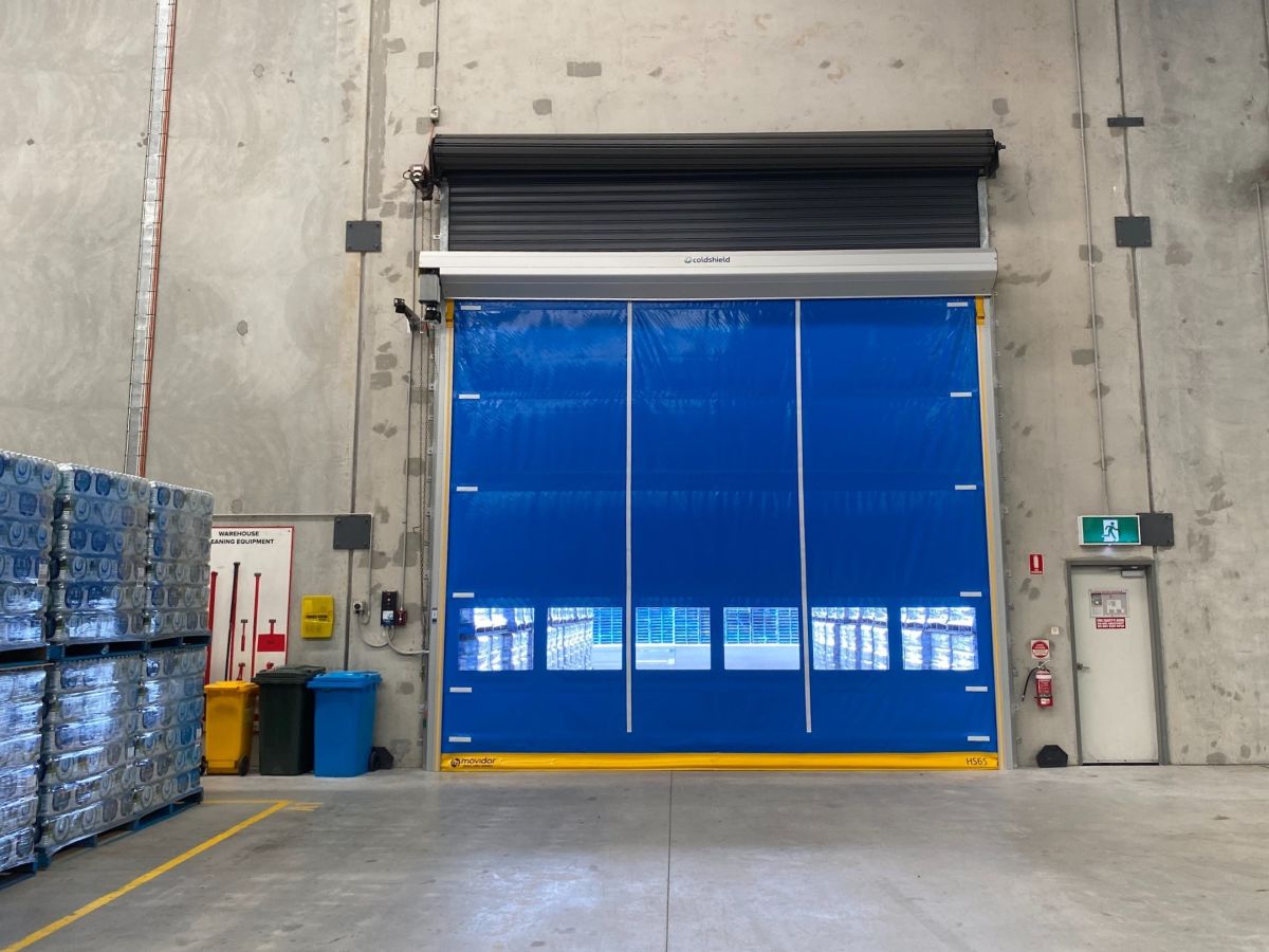 A large high speed door inside a factory.