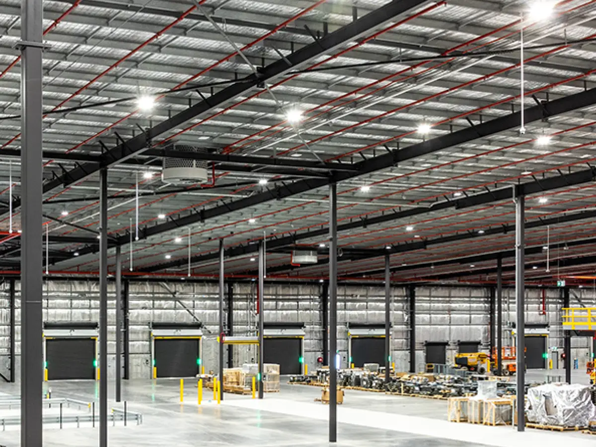 Interior of a pharmaceutical warehouse with several Movidor HS series high speed rapid doors in various custom sizes