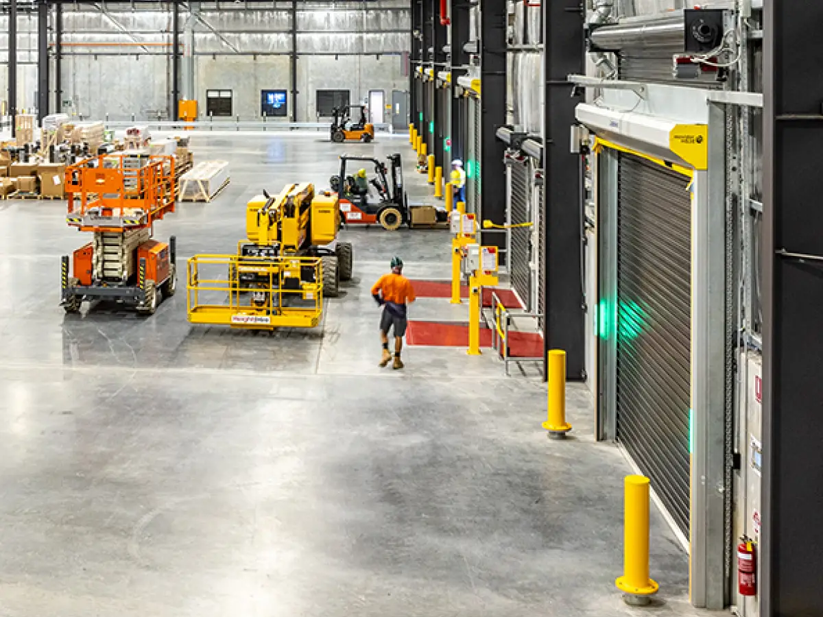 Interior of a pharmaceutical warehouse with several Movidor HS series high speed rapid roll doors