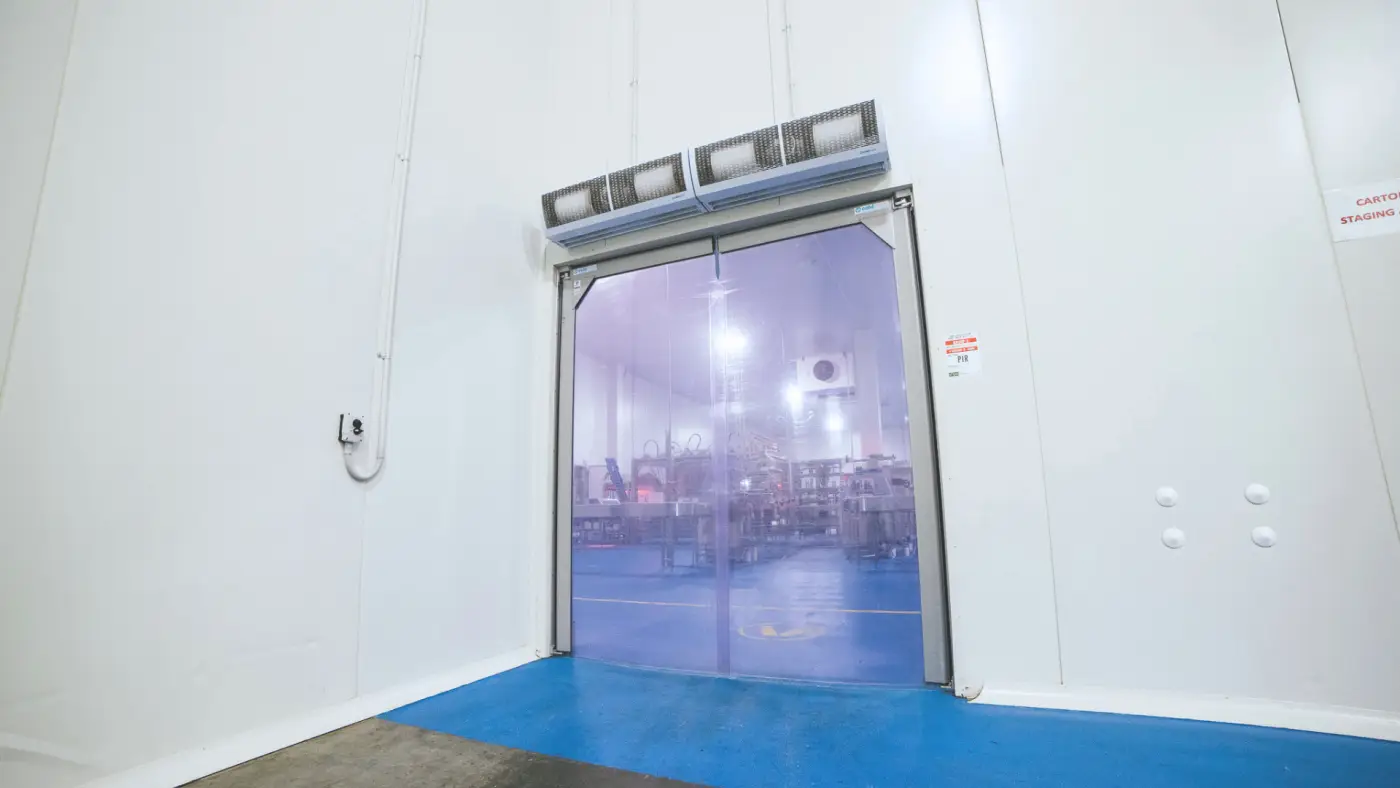 air curtain on top of pvc swing doors for food production site