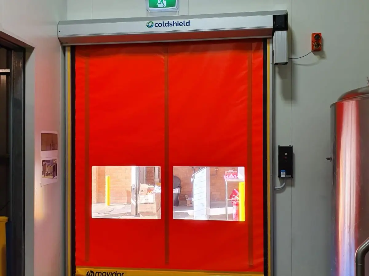 ex series roller door with red curtain in food processing facility