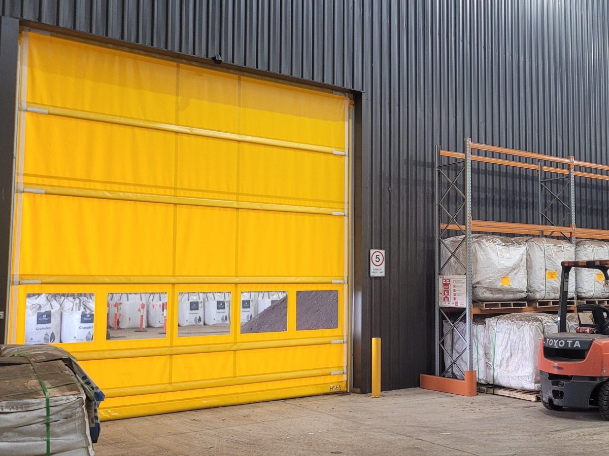 A large high speed door inside an industrial facility.