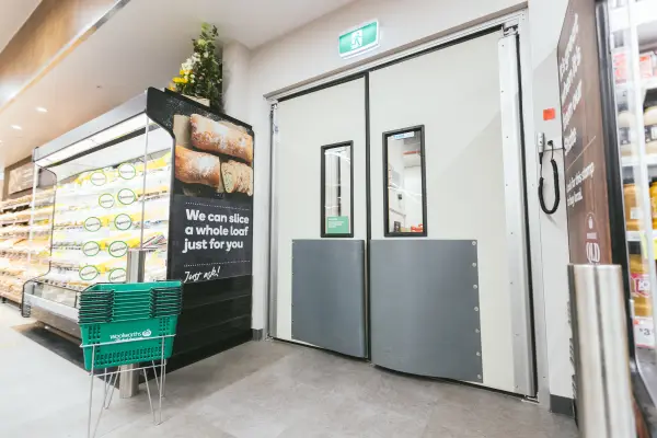 A Coldshield series 4500 traffic swing doors at Woolworths