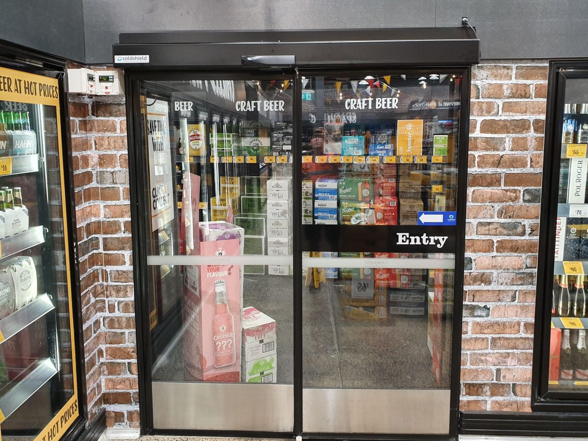 An automatic sliding door inside a retail shop.