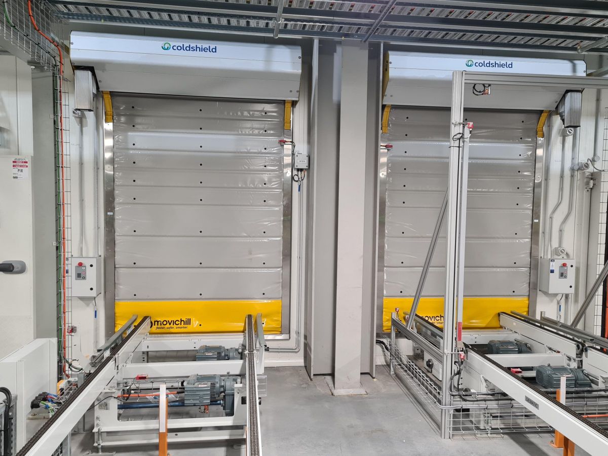 Two Movichill insulated high speed doors inside a warehouse.