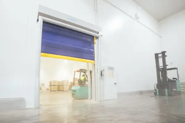 An open Movichill rapid roll door inside a cold storage facility.